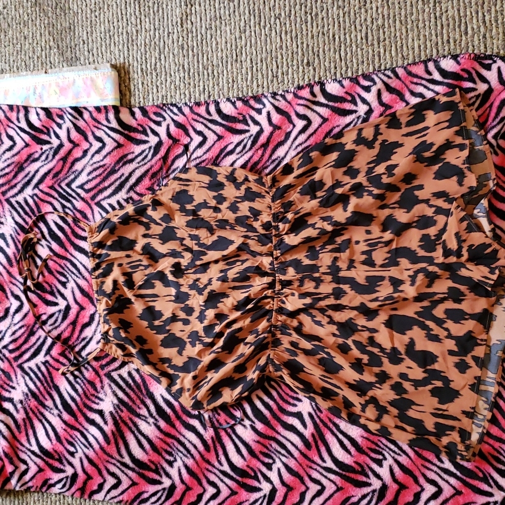Halter tie leopard rompers from Shein size XL.    A-2